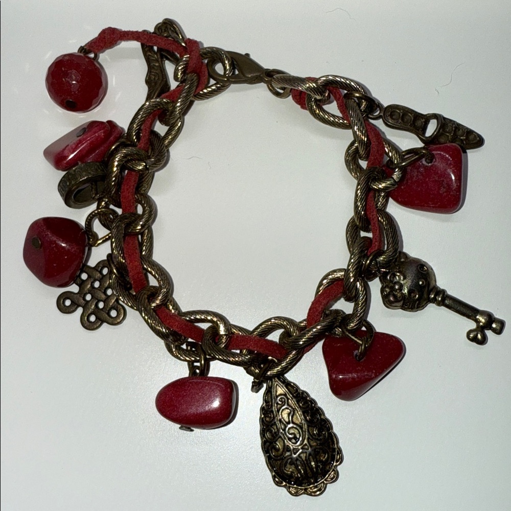 Adorable red brassy brass tone charm hello kitty charm Bracelet shoe key adorbs.